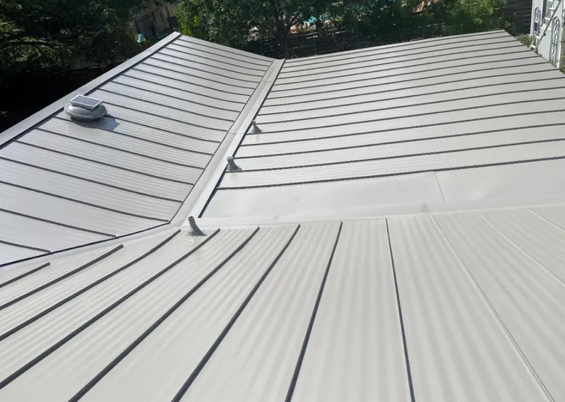 Solar attic fan installed on a metal roof for Roof Ventilation in Crestline